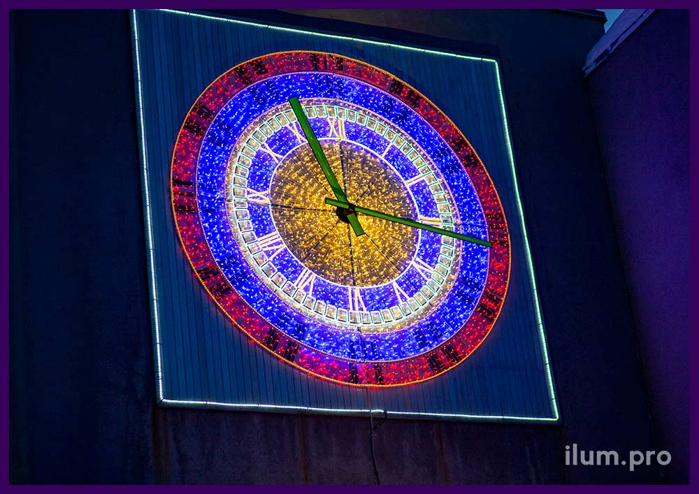 Часы светодиодные из гирлянд на металлическом каркасе белого, синего и красного цвета