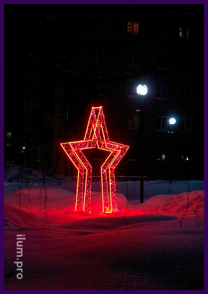 Новогодняя декоративная арка в форме красной звезды с гирляндами