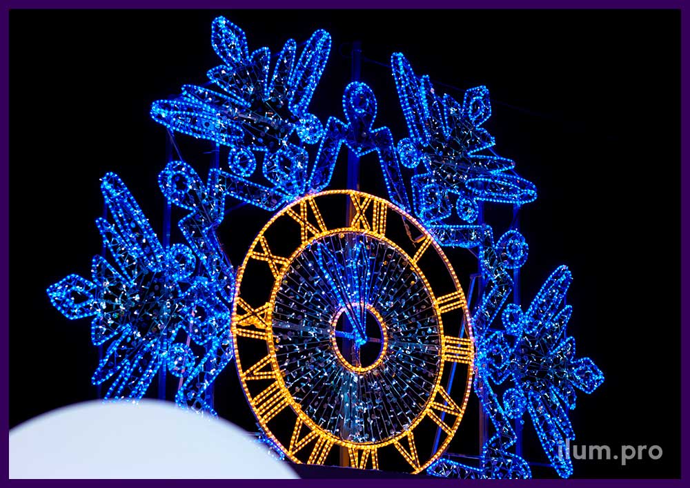 Новогодняя фотозона в форме снежинки с часами из блёсток, гирлянд и дюралайта в Копейске