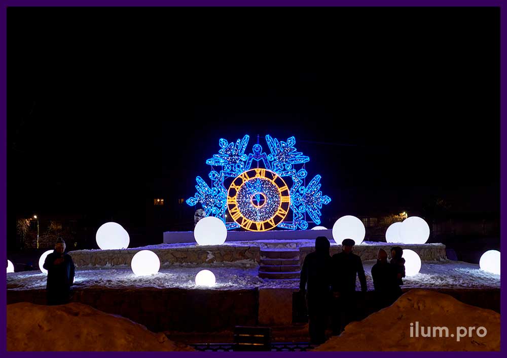 Фотозона в форме снежинки с часами из алюминиевого профиля и светодиодной иллюминации разных цветов