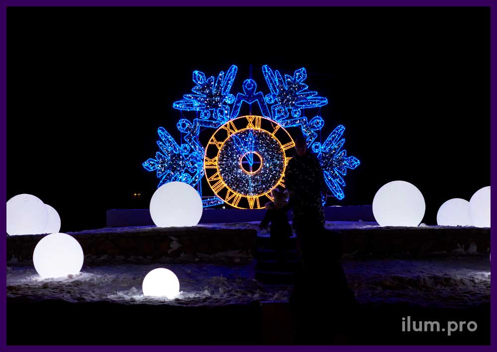 Фотозона из гирлянд и дюралайта на каркасе из алюминиевого профиля в форме часов со снежинкой