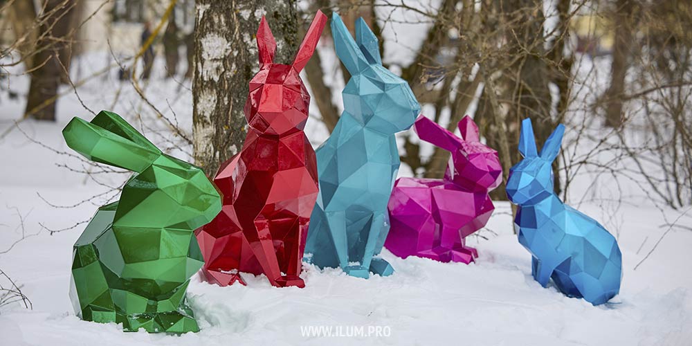Полигональные зайцы разных цветов с эффектом «кэнди»